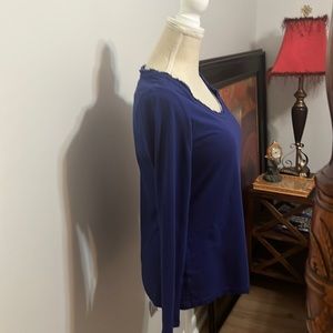 Navy t-shirt, lower cut U neck very soft.